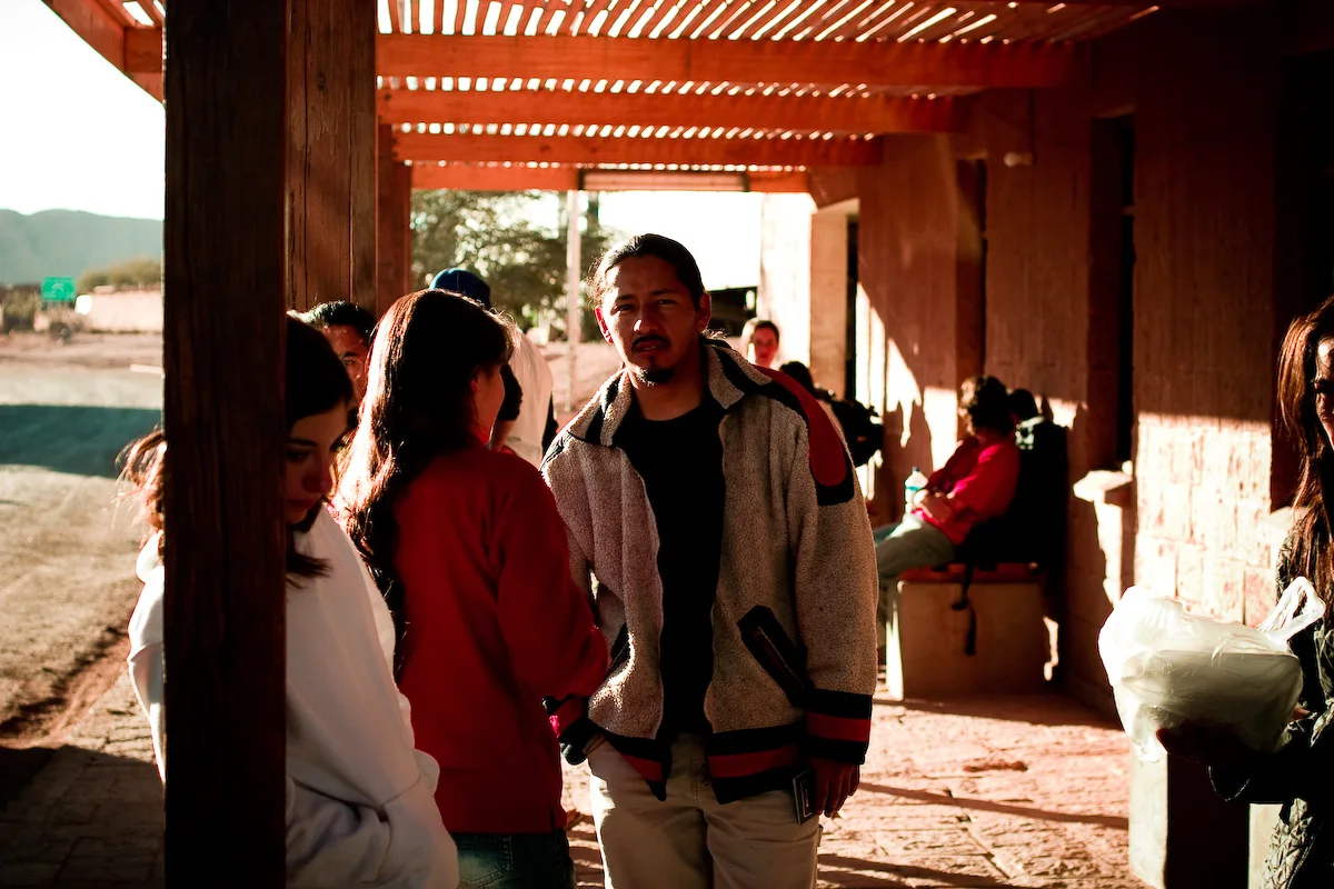 Members of Los Danzares waiting at the Argentina–Chile border