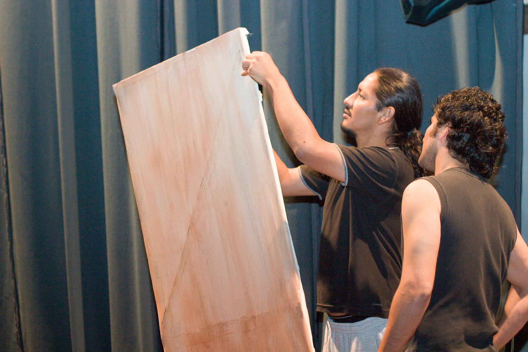 People building scenery together on a stage in Salta